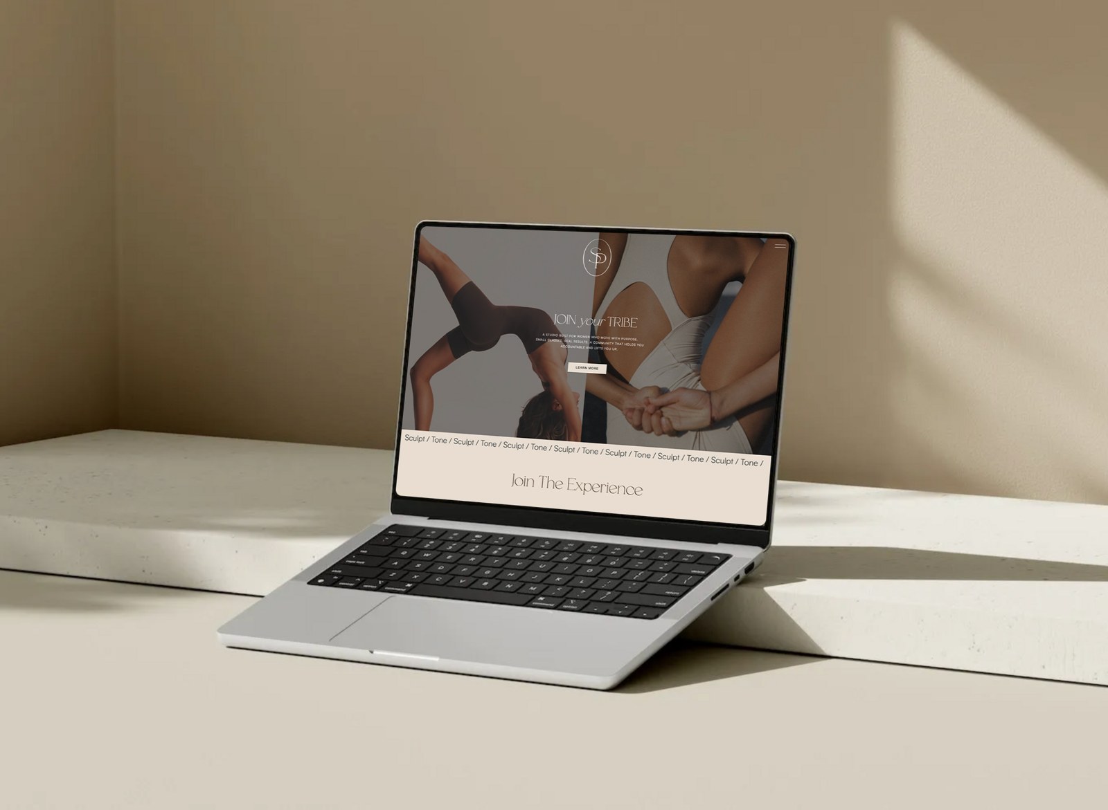 Solène Pilates Studio website homepage shown on a laptop