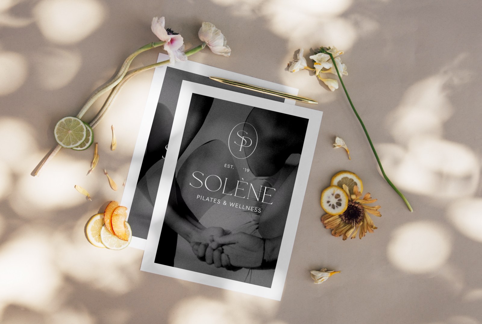 Solène Pilates printed brand piece with monogram and wordmark over movement photography